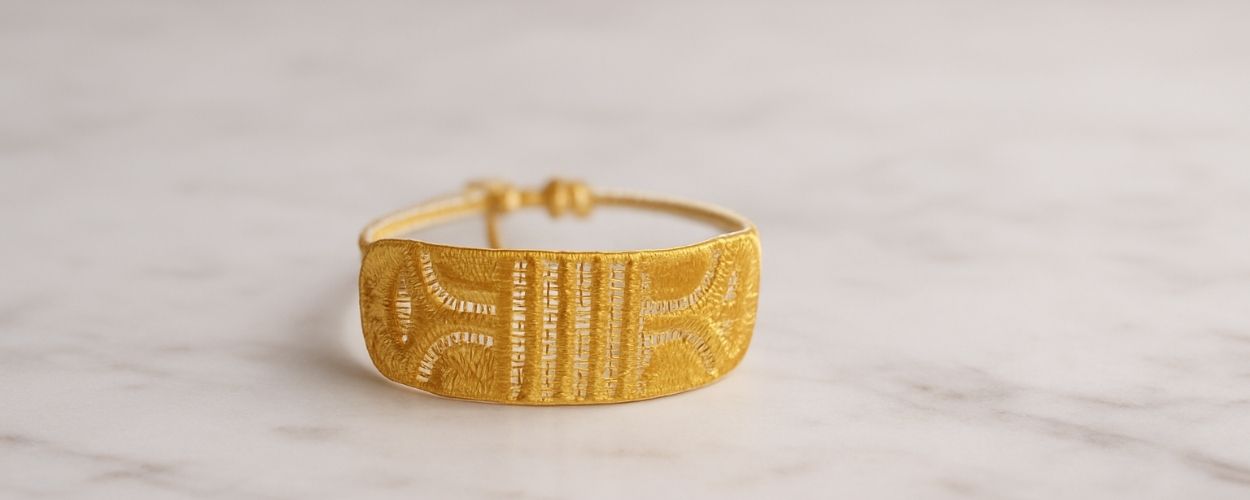 Bracelet manchette dorée de missiu