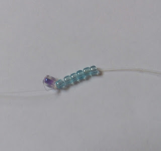 1769813920 21 Belle fleur perlee selon la technique du filet de perles