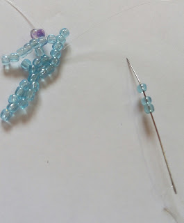 1769813932 873 Belle fleur perlee selon la technique du filet de perles