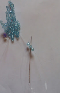 1769813938 248 Belle fleur perlee selon la technique du filet de perles