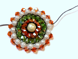 1770670937 873 Brick stitch autour dune perle